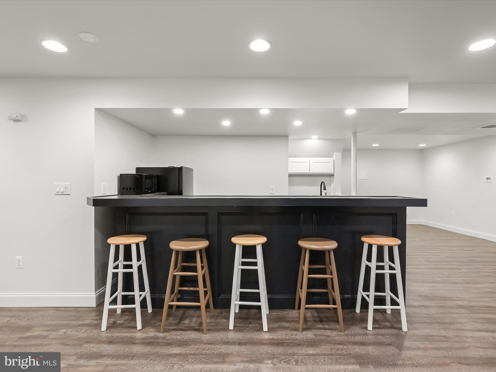 3720 Buffalo Road New Windsor, MD 21776 - Photo 55 of 115 a kitchen with a sink cabinets and wooden floor