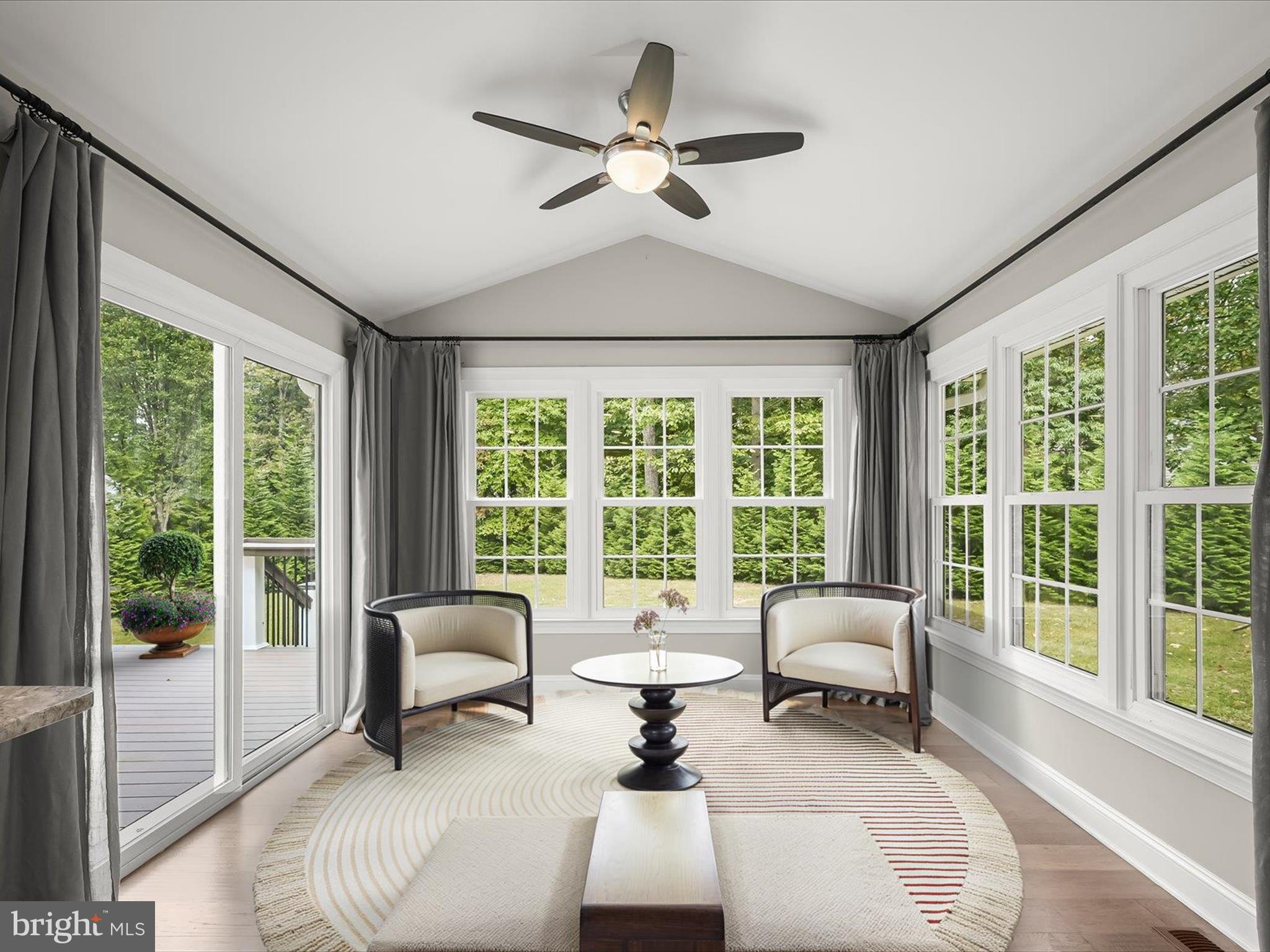 3720 Buffalo Road New Windsor, MD 21776 - Photo 6 of 115 a living room with furniture and a large window with balcony view