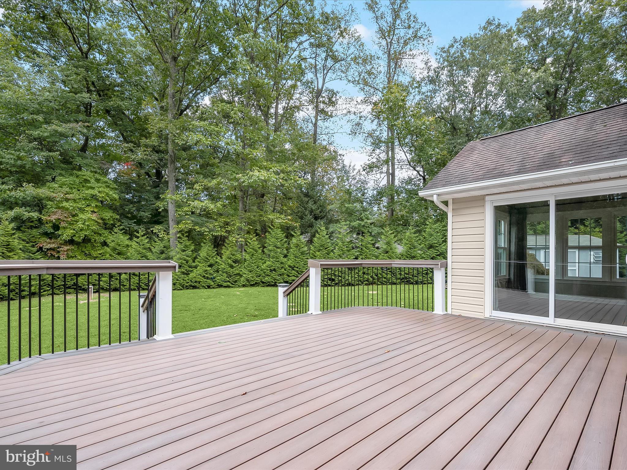 3720 Buffalo Road New Windsor, MD 21776 - Photo 68 of 115 a view of a house with a wooden deck