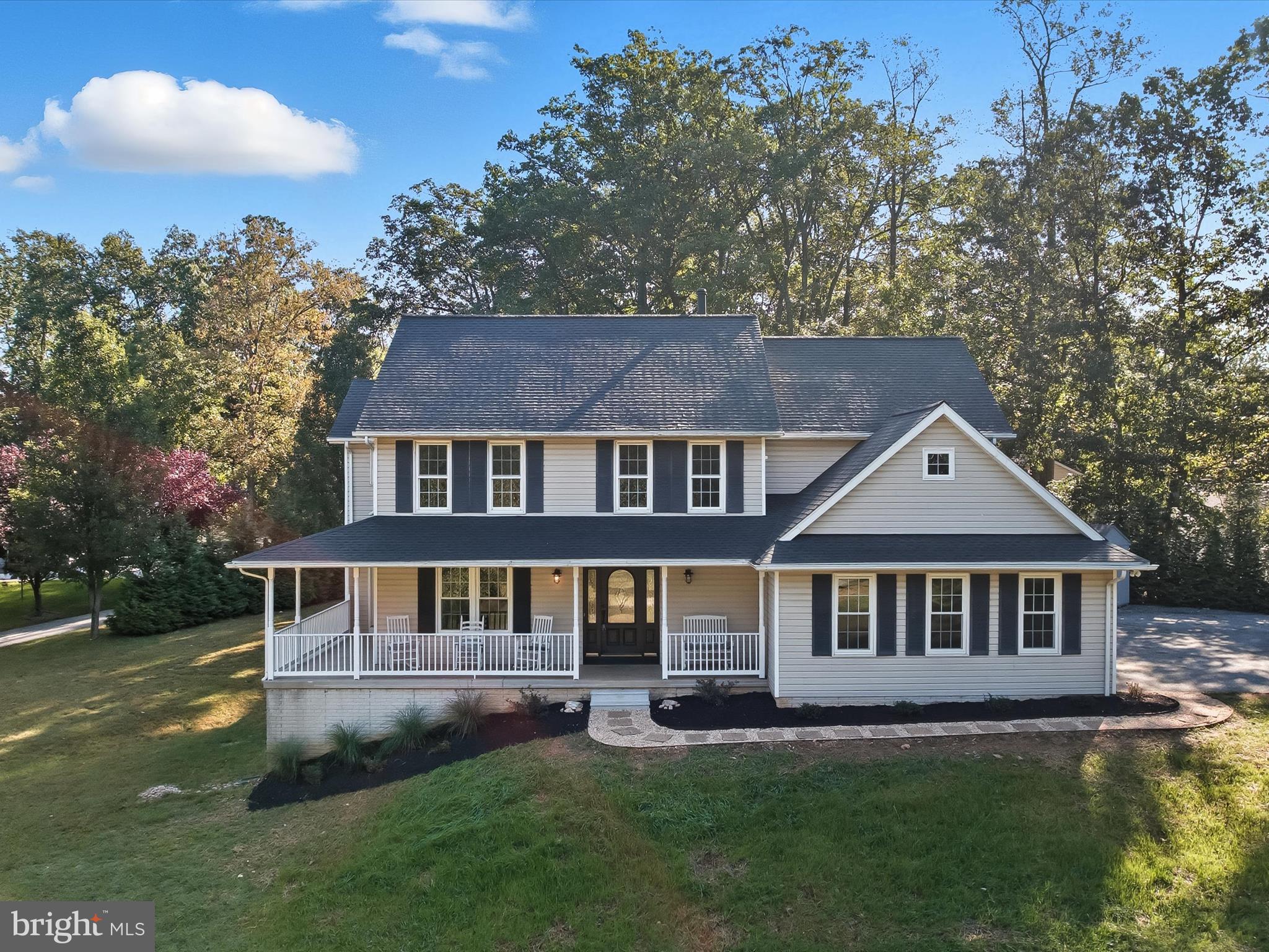 3720 Buffalo Road New Windsor, MD 21776 - Photo 74 of 115 a front view of a house with a garden