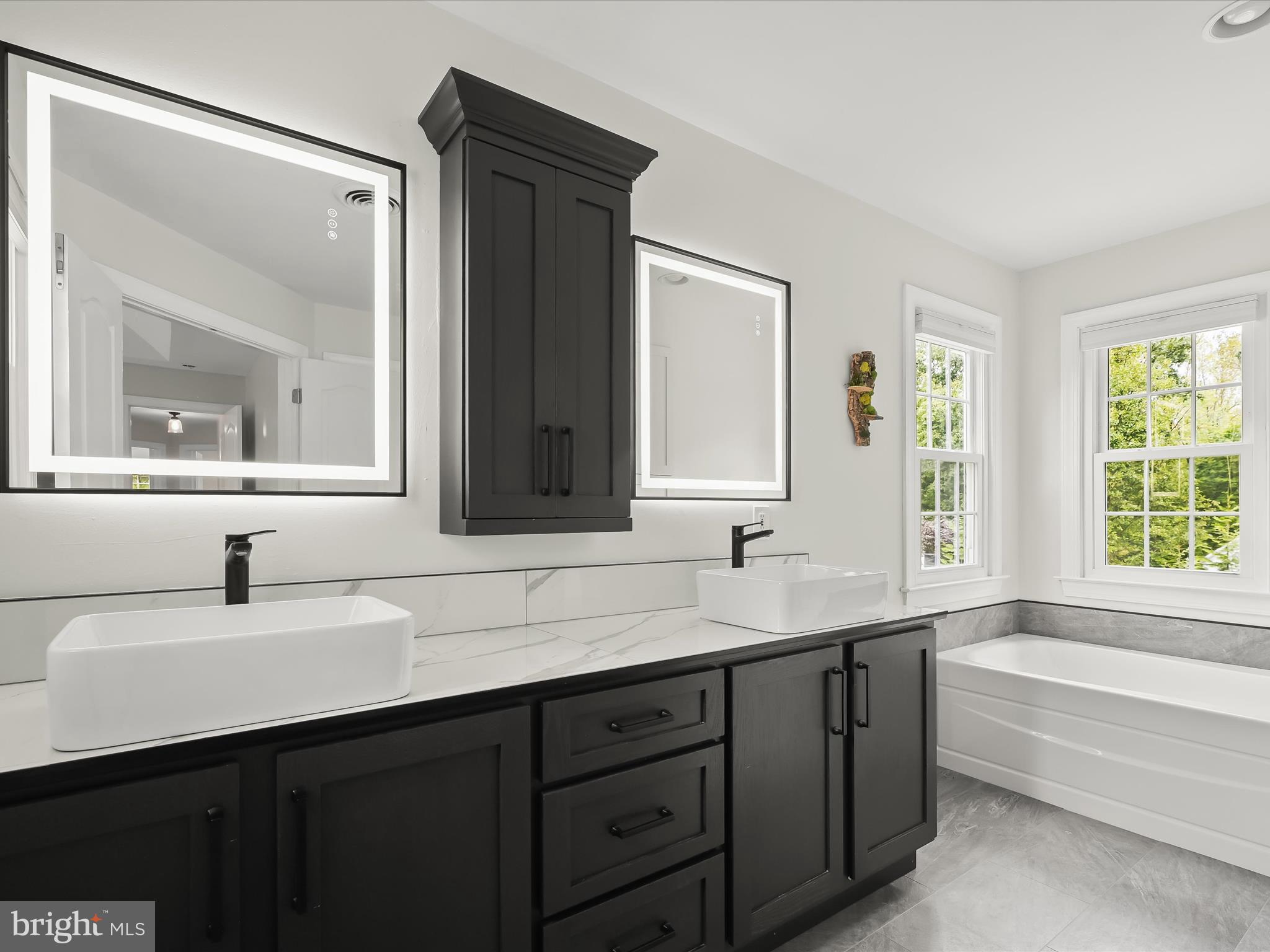 3720 Buffalo Road New Windsor, MD 21776 - Photo 8 of 115 a bathroom with a tub sink and mirror