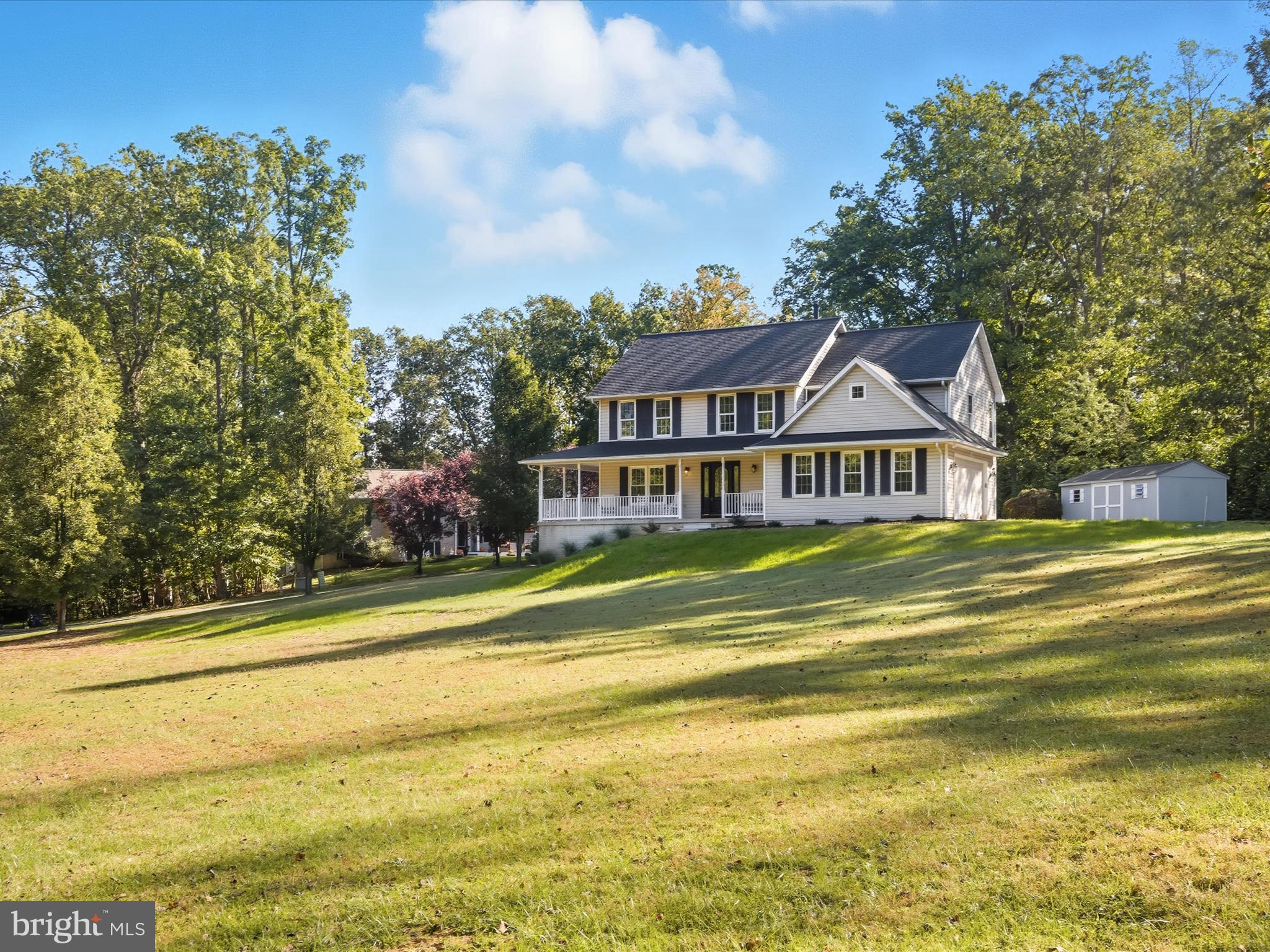3720 Buffalo Road New Windsor, MD 21776 - Photo 78 of 115 a front view of a house with a yard table and chairs