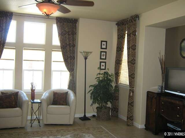 2130 Angel Ridge Drive Reno, NV 89521 - Photo 3 of 12 a living room with furniture and a window