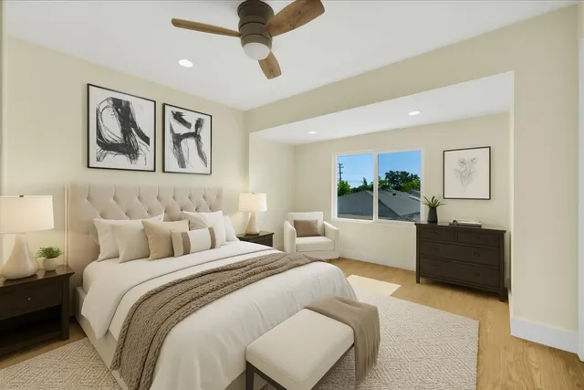 a bedroom with a bed and a couch