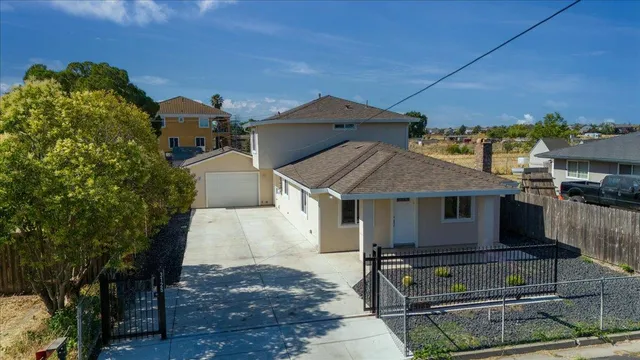 a aerial view of a house with a garden