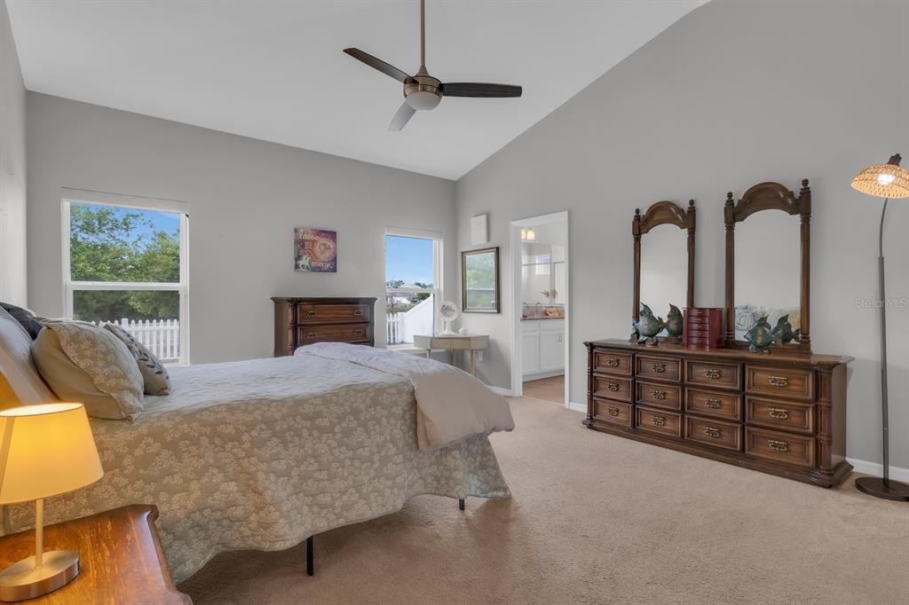 3468 Middlebrook Place St. Cloud, FL 34773 - Photo 12 of 32 a bed room with a bed and a dresser