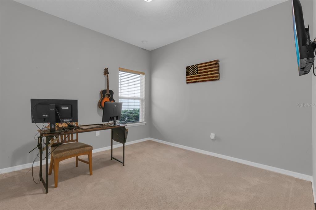 3468 Middlebrook Place St. Cloud, FL 34773 - Photo 18 of 32 a living room with furniture and a window