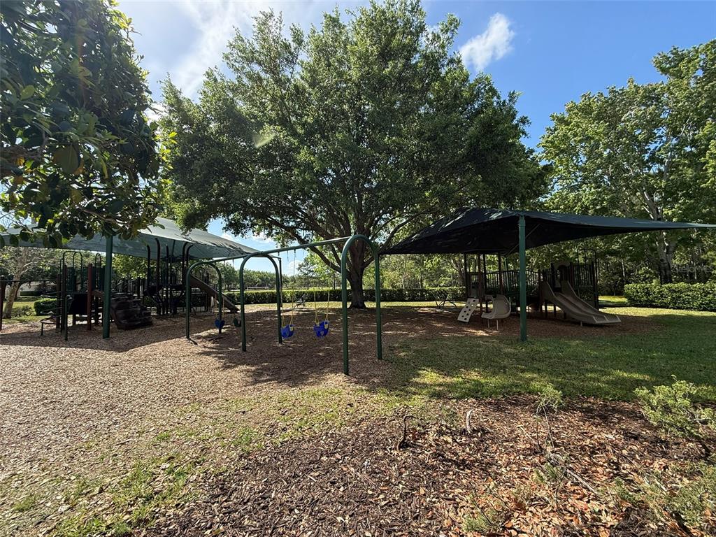 3468 Middlebrook Place St. Cloud, FL 34773 - Photo 23 of 32 a view of a park with large trees