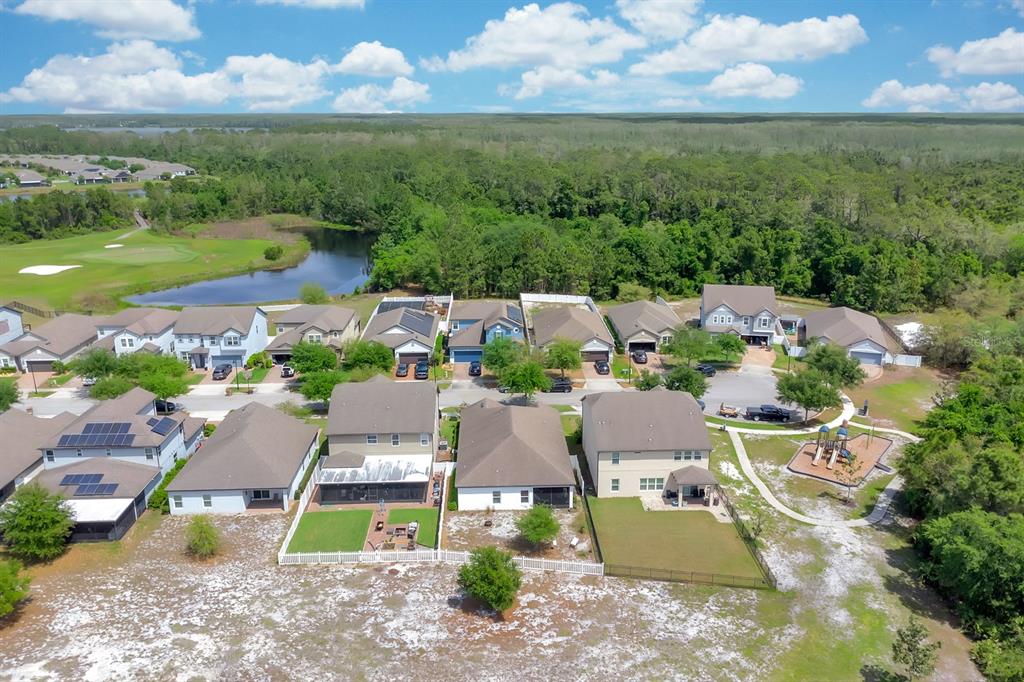 3468 Middlebrook Place St. Cloud, FL 34773 - Photo 32 of 32 an aerial view of residential houses with outdoor space and ocean view