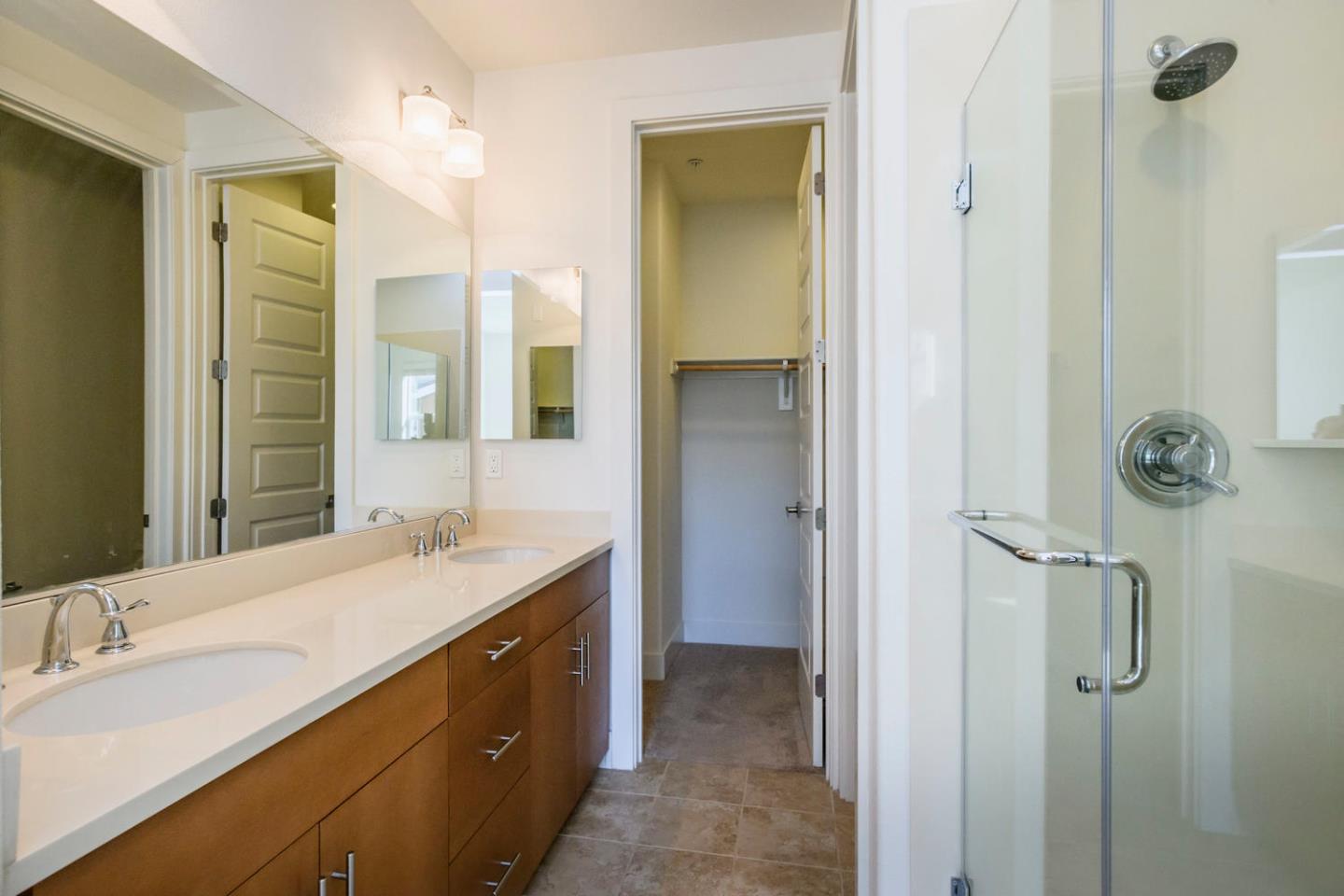 2912 Shoemaker Dr. San Mateo, CA 94403 - Photo 14 of 27 a bathroom with a double vanity sink mirror and shower