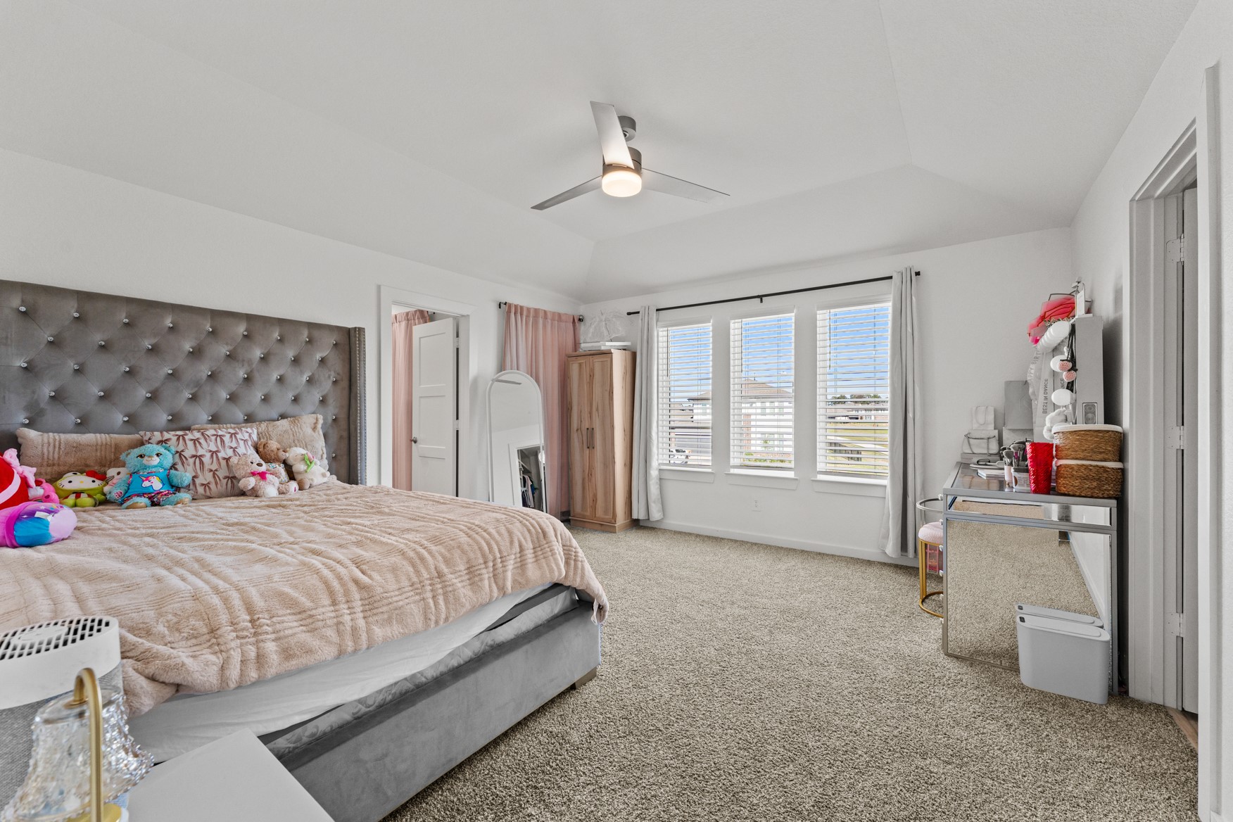 22503 Modica Rift Lane Katy, TX 77449 - Photo 28 of 42 a bedroom with a bed and a large window