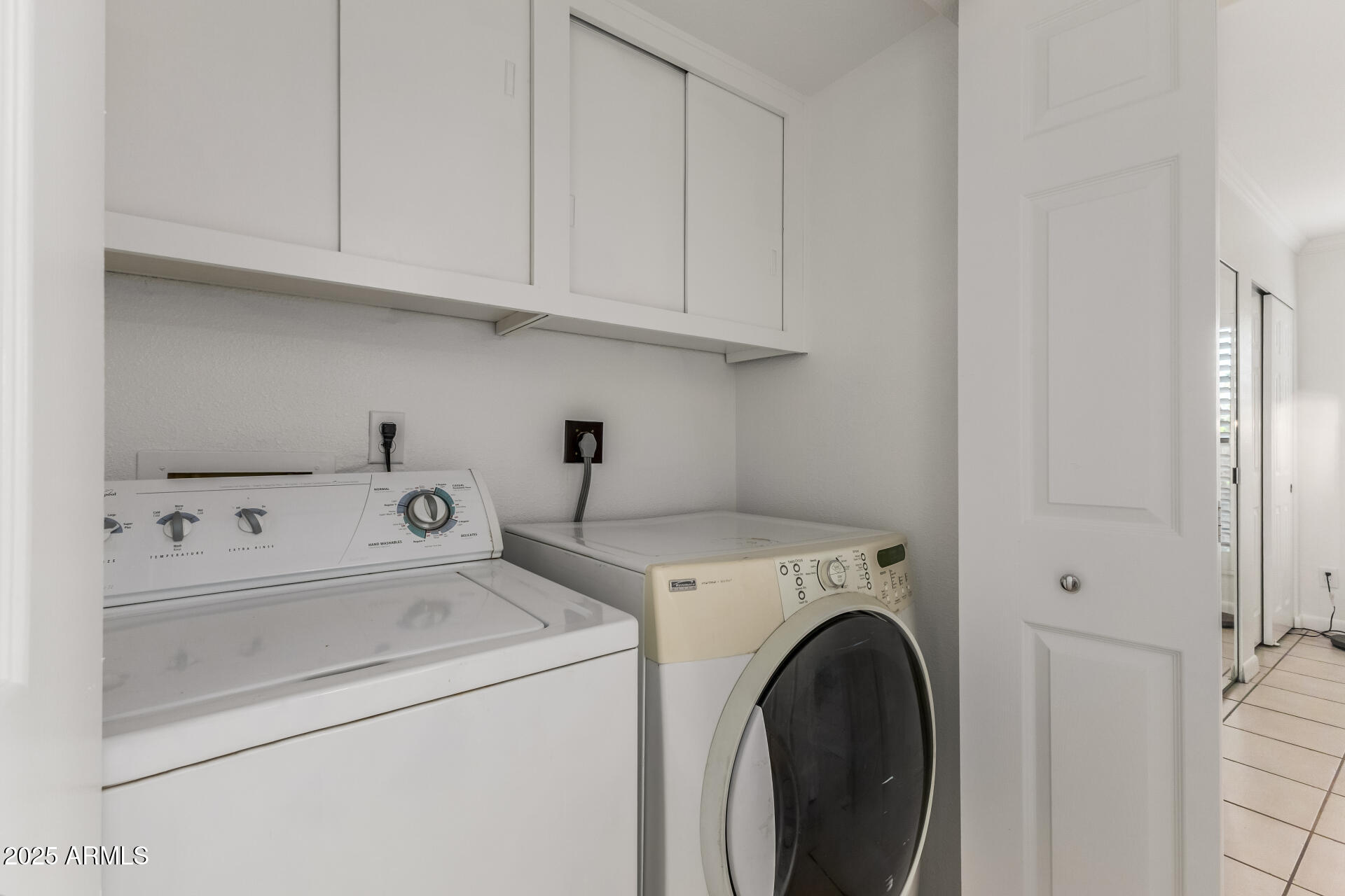 5136 North 31st Place, Unit 634 Phoenix, AZ 85016 - Photo 22 of 45 a utility room with dryer and washer