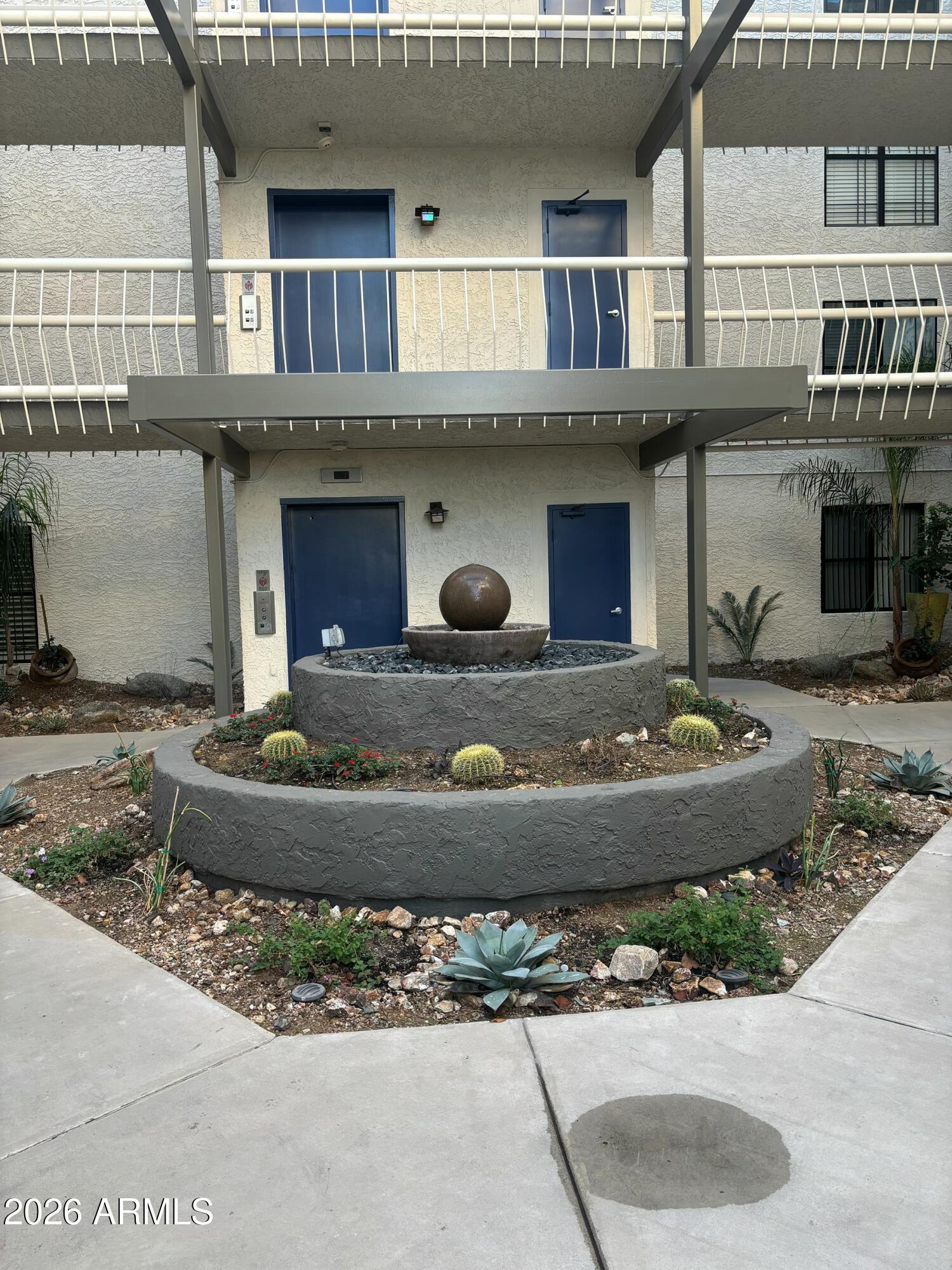 5136 North 31st Place, Unit 634 Phoenix, AZ 85016 - Photo 32 of 45 a front view of a house with entertaining space