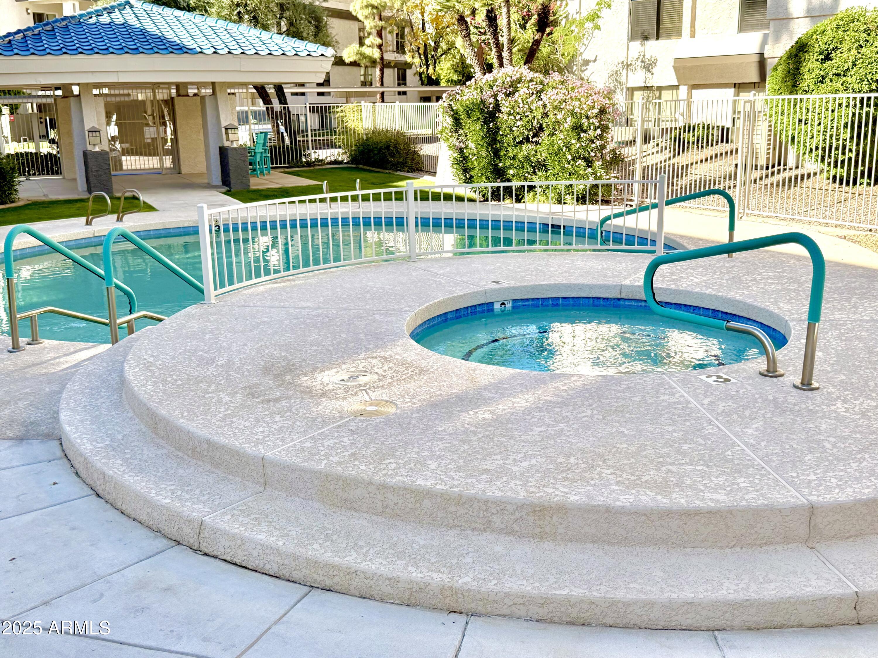 5136 North 31st Place, Unit 634 Phoenix, AZ 85016 - Photo 37 of 45 a view of outdoor space swimming pool and outdoor seating