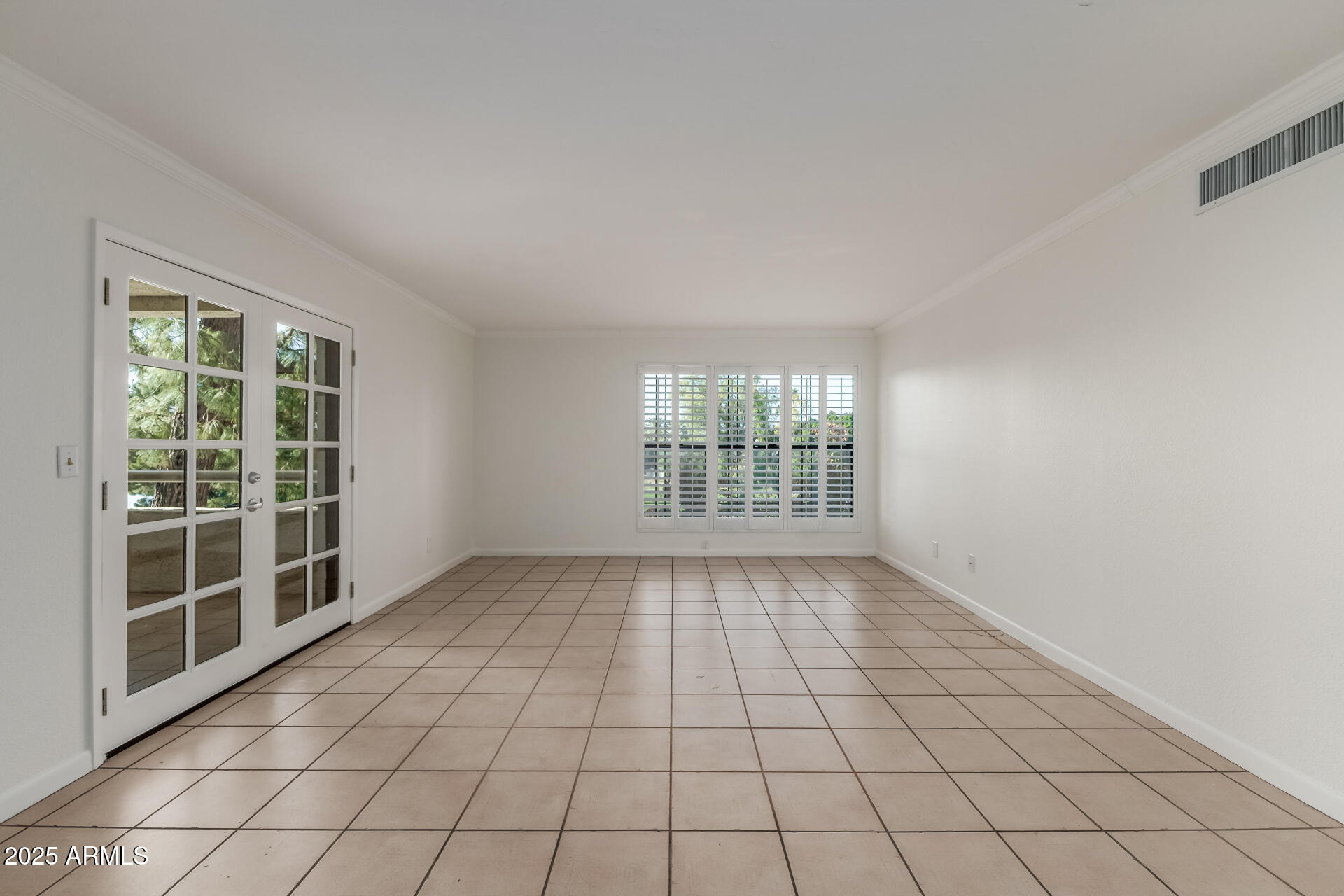 5136 North 31st Place, Unit 634 Phoenix, AZ 85016 - Photo 7 of 45 a view of an empty room with a window