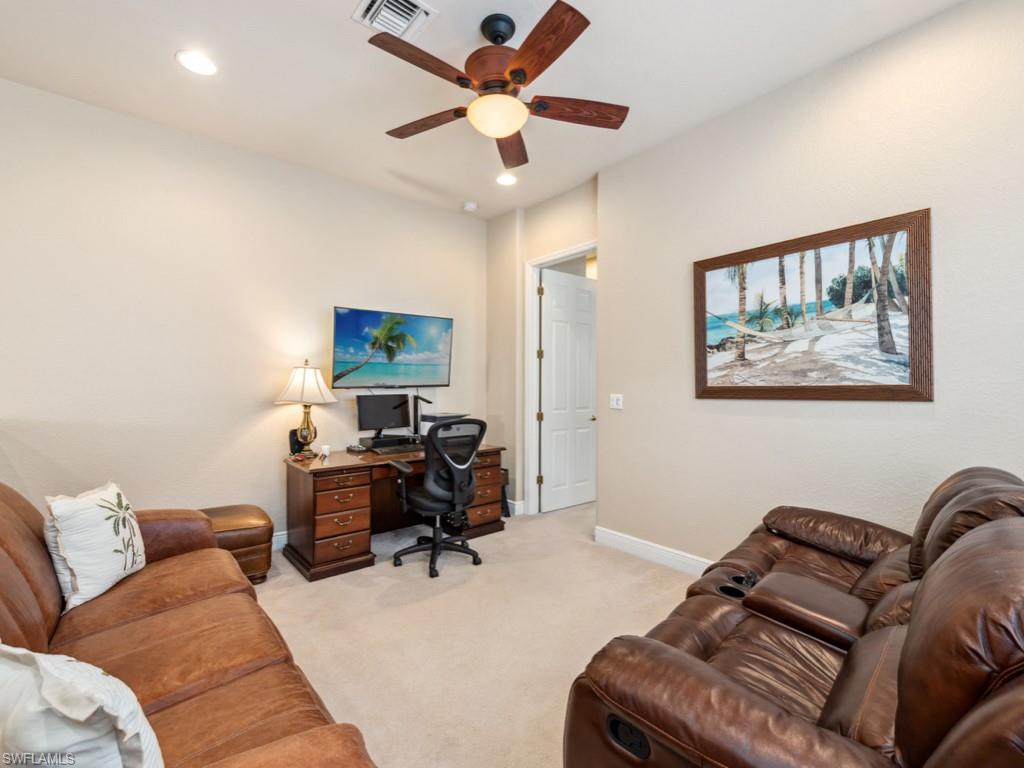 5705 Mango Circle Naples, FL 34110 - Photo 15 of 48 a living room with furniture