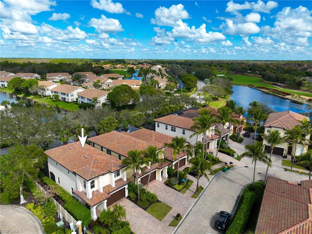 5705 Mango Circle Naples, FL 34110 - Photo 23 of 48 an aerial view of multiple house