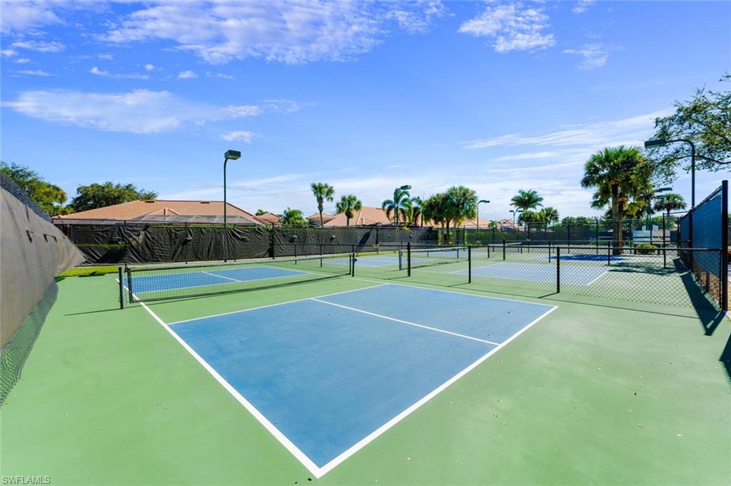 5705 Mango Circle Naples, FL 34110 - Photo 41 of 48 a view of a tennis court