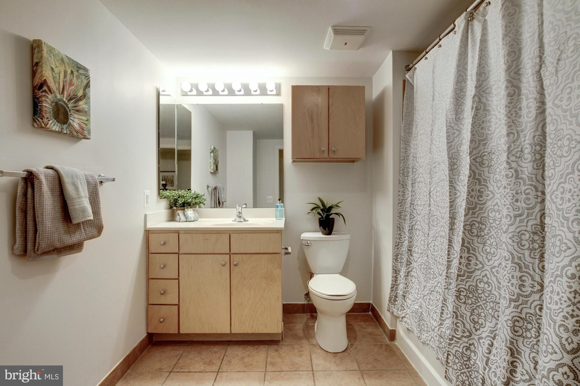 616 E Street Northwest, Unit 304 Washington, DC 20004 - Photo 13 of 28 Spacious bathroom