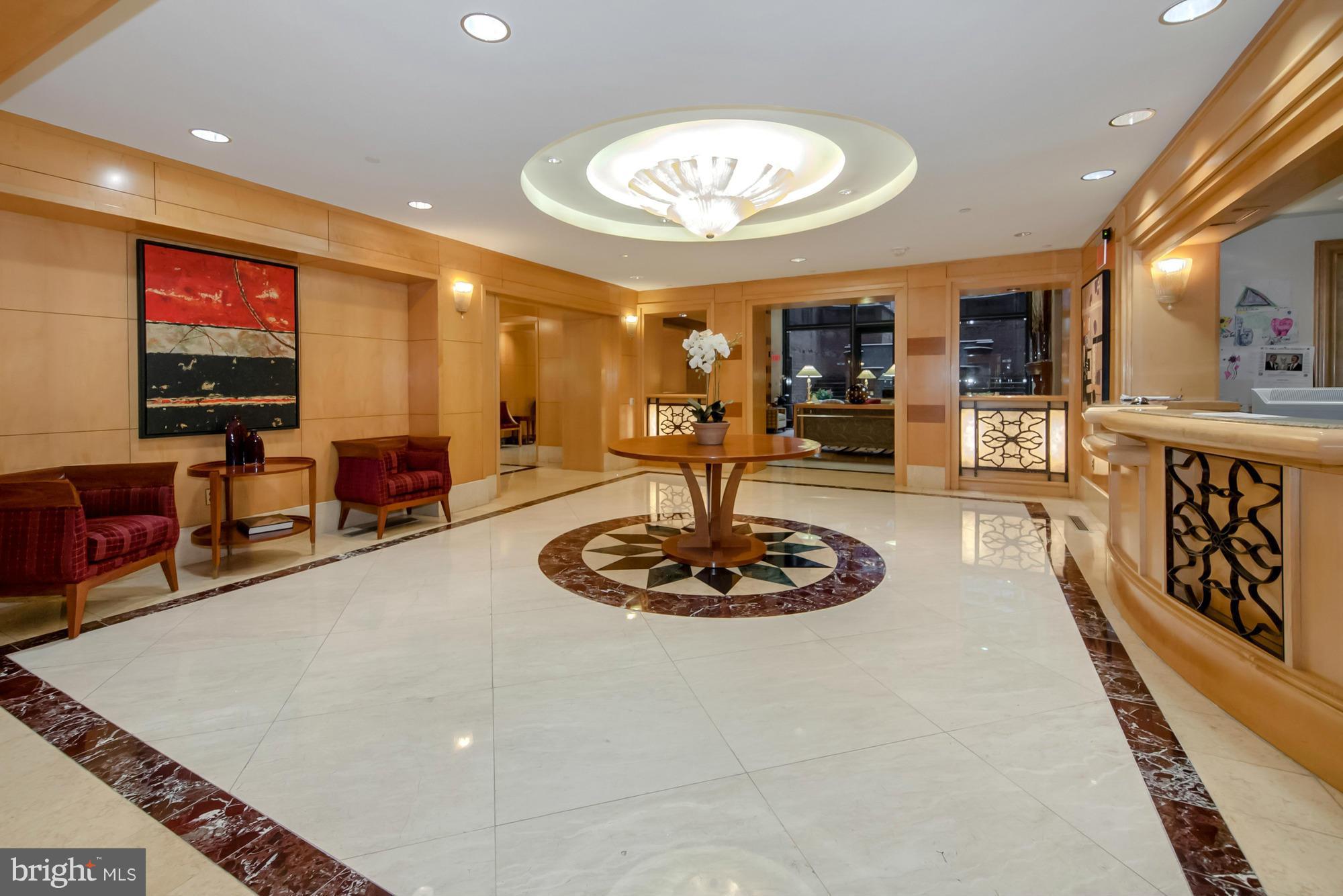 616 E Street Northwest, Unit 304 Washington, DC 20004 - Photo 4 of 28 Lobby entrance/concierge