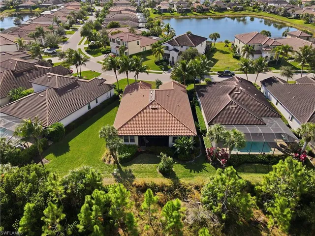 an aerial view of a house with outdoor space