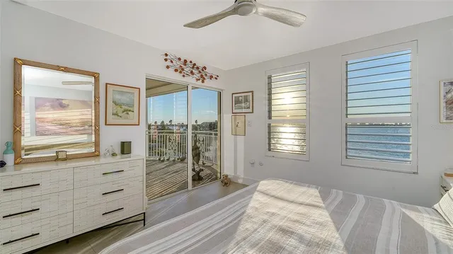 a bathroom with a sink vanity mirror and toilet