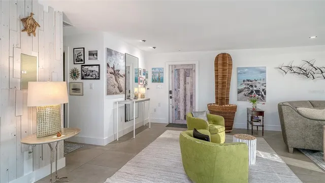 a kitchen with stainless steel appliances a sink a stove a refrigerator cabinets and a counter top space