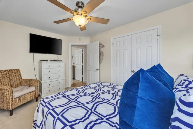 a bedroom with a bed and furniture