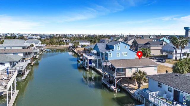 a view of a lake in middle of the town