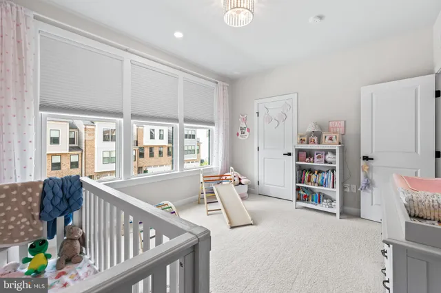 a bedroom with a bed and a cabinets