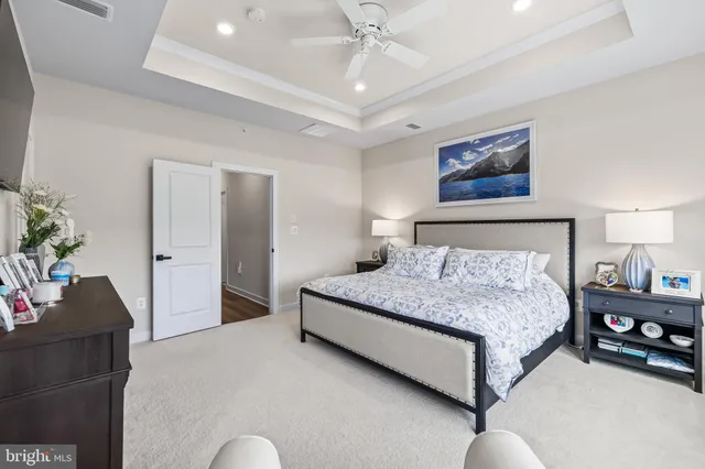 a bathroom with a double vanity sink mirror and