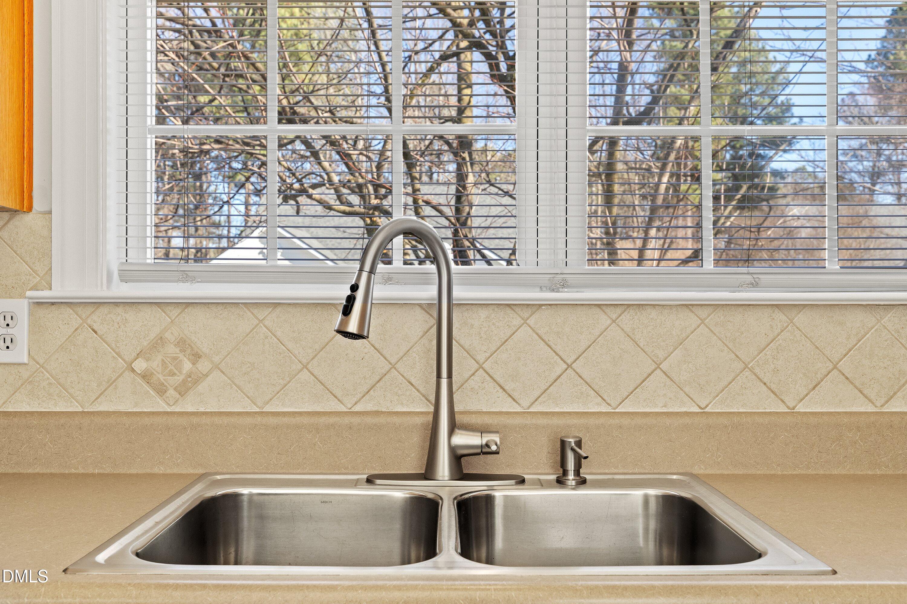 105 Rockport Ridge Way Cary, NC 27519 - Photo 10 of 43 a sink with a window