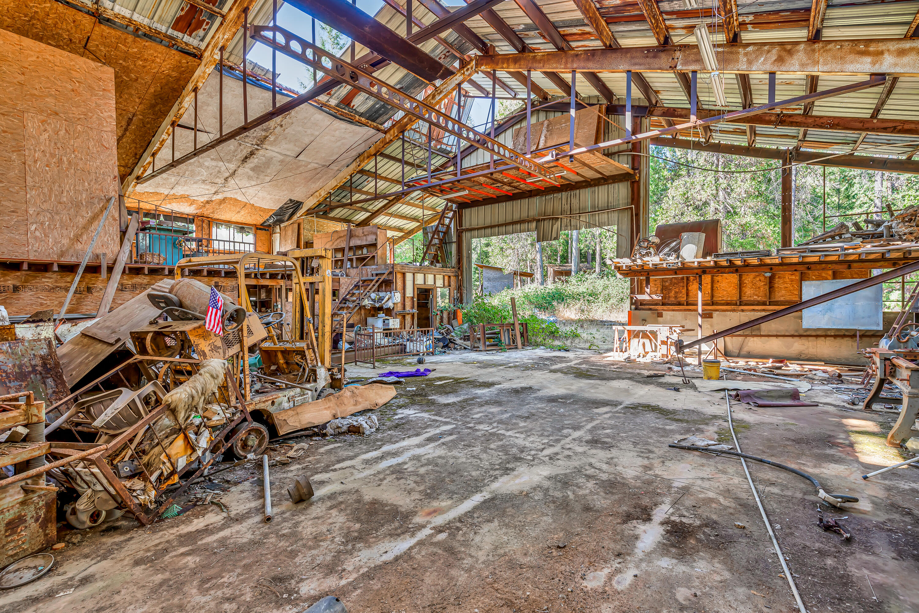 9184 West Evans Creek Road Rogue River, OR 97537 - Photo 14 of 29 a view of a room with racks on the wall