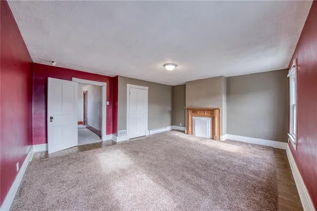a white toilet sitting next to a bathroom sink