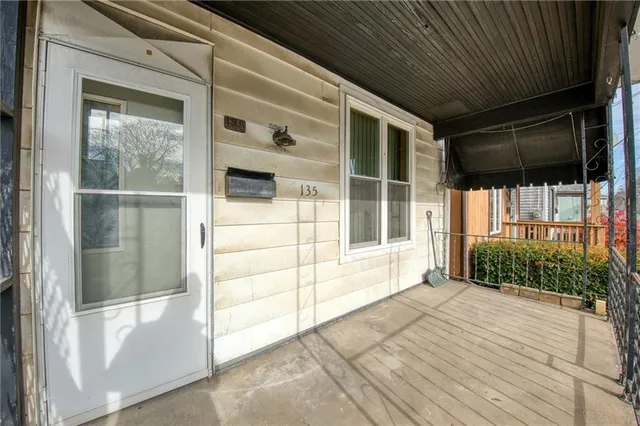 a view of house with backyard