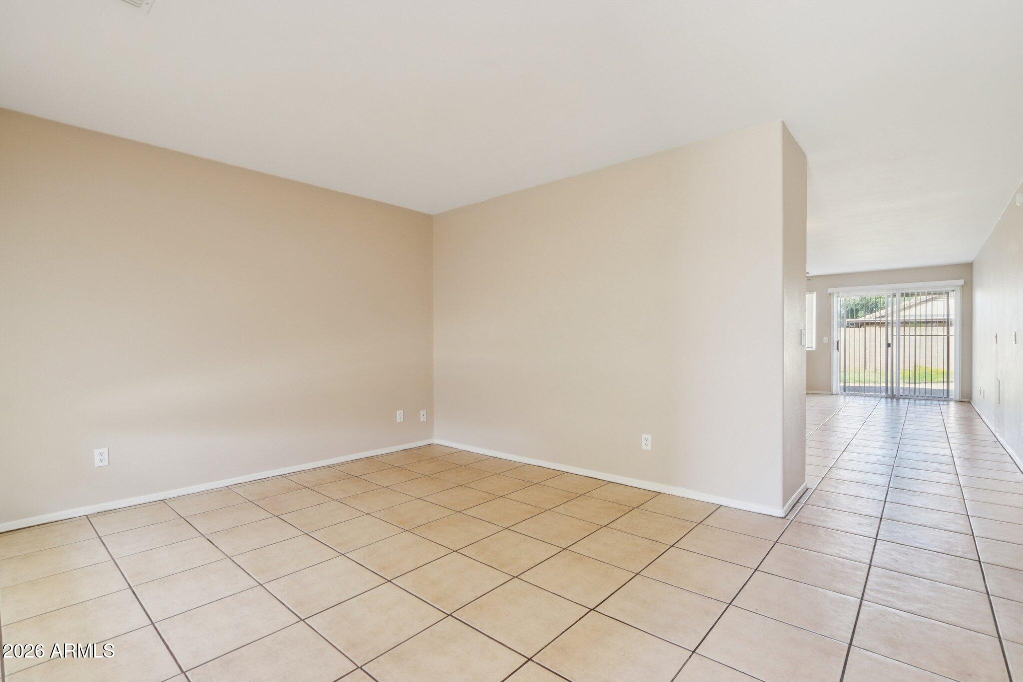 3326 West Shumway Farm Road Phoenix, AZ 85041 - Photo 5 of 30 a view of an empty room