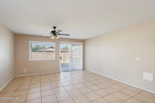 a view of an empty room and window