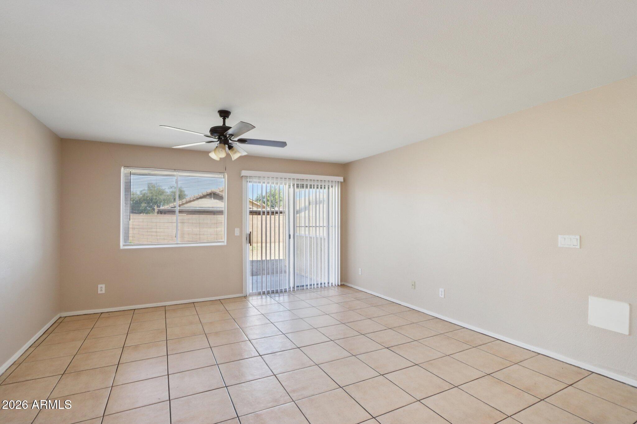 3326 West Shumway Farm Road Phoenix, AZ 85041 - Photo 8 of 30 a view of an empty room and window
