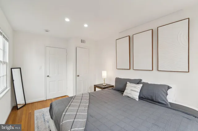 a bed room with a bed and a couch