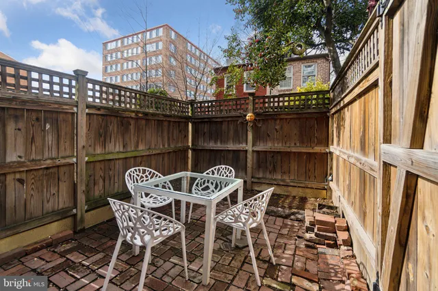 a view of a chairs and table on the terrace