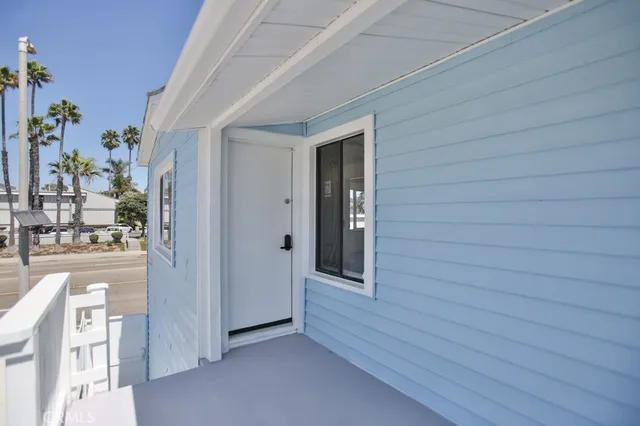 a view of front door and bedroom