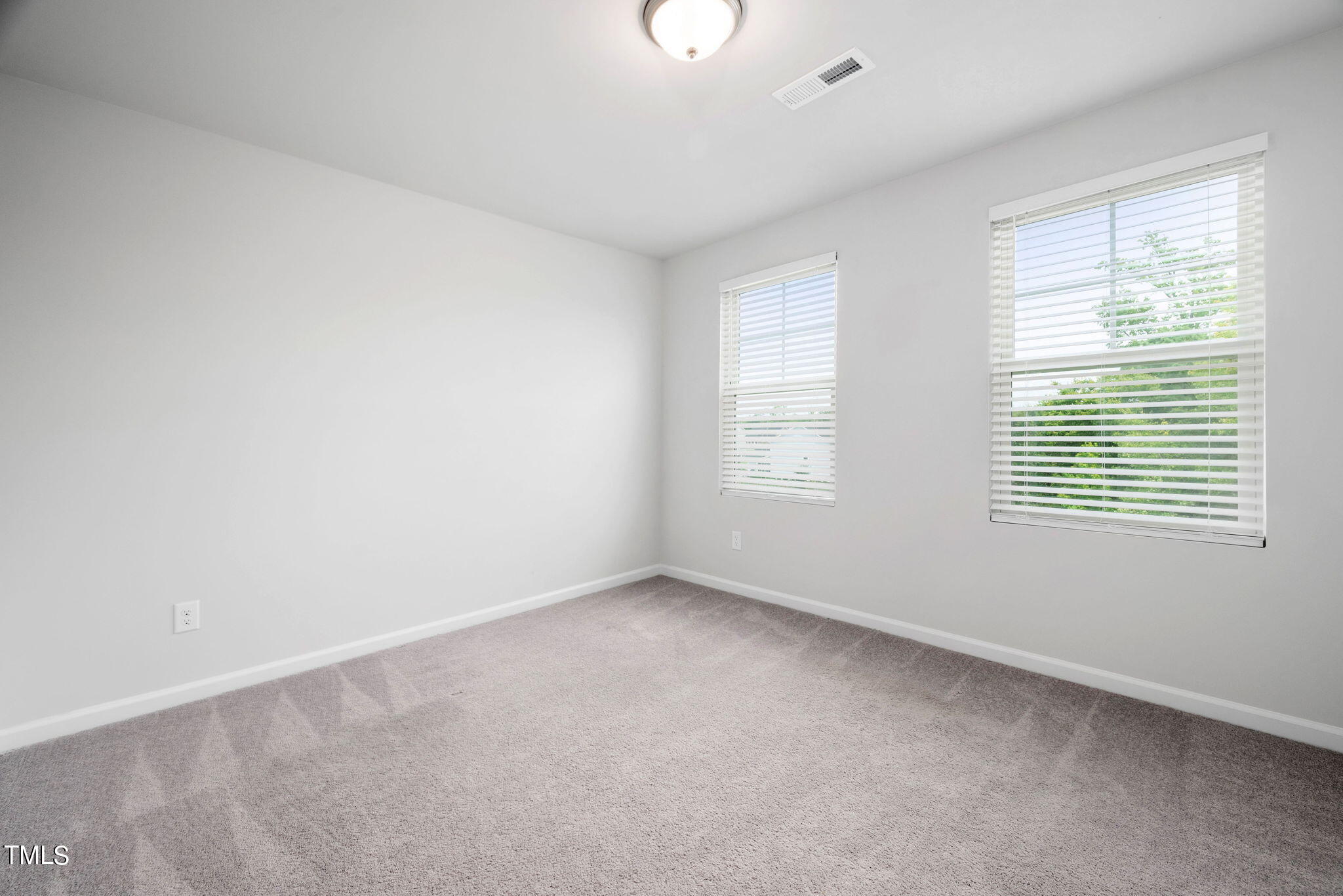 6231 Truxton Lane Raleigh, NC 27616 - Photo 21 of 36 Secondary Upstairs Bedroom