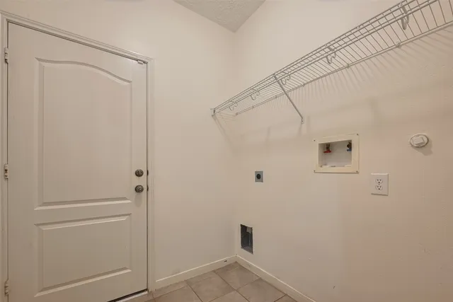 a view of a backyard with sitting area