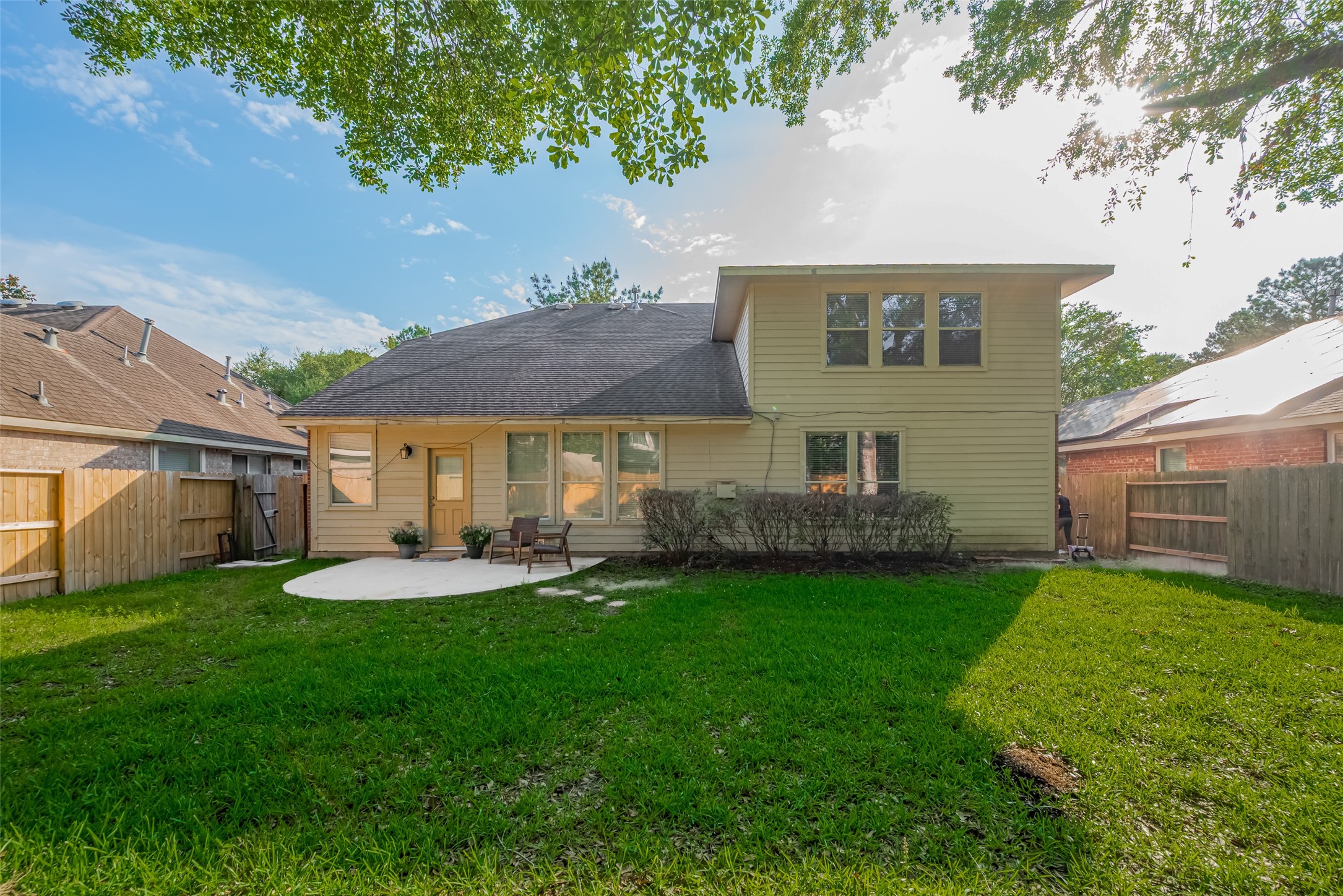 31214 Windcrest Park Lane Spring, TX 77386 - Photo 43 of 45 a front view of a house with a yard and a porch