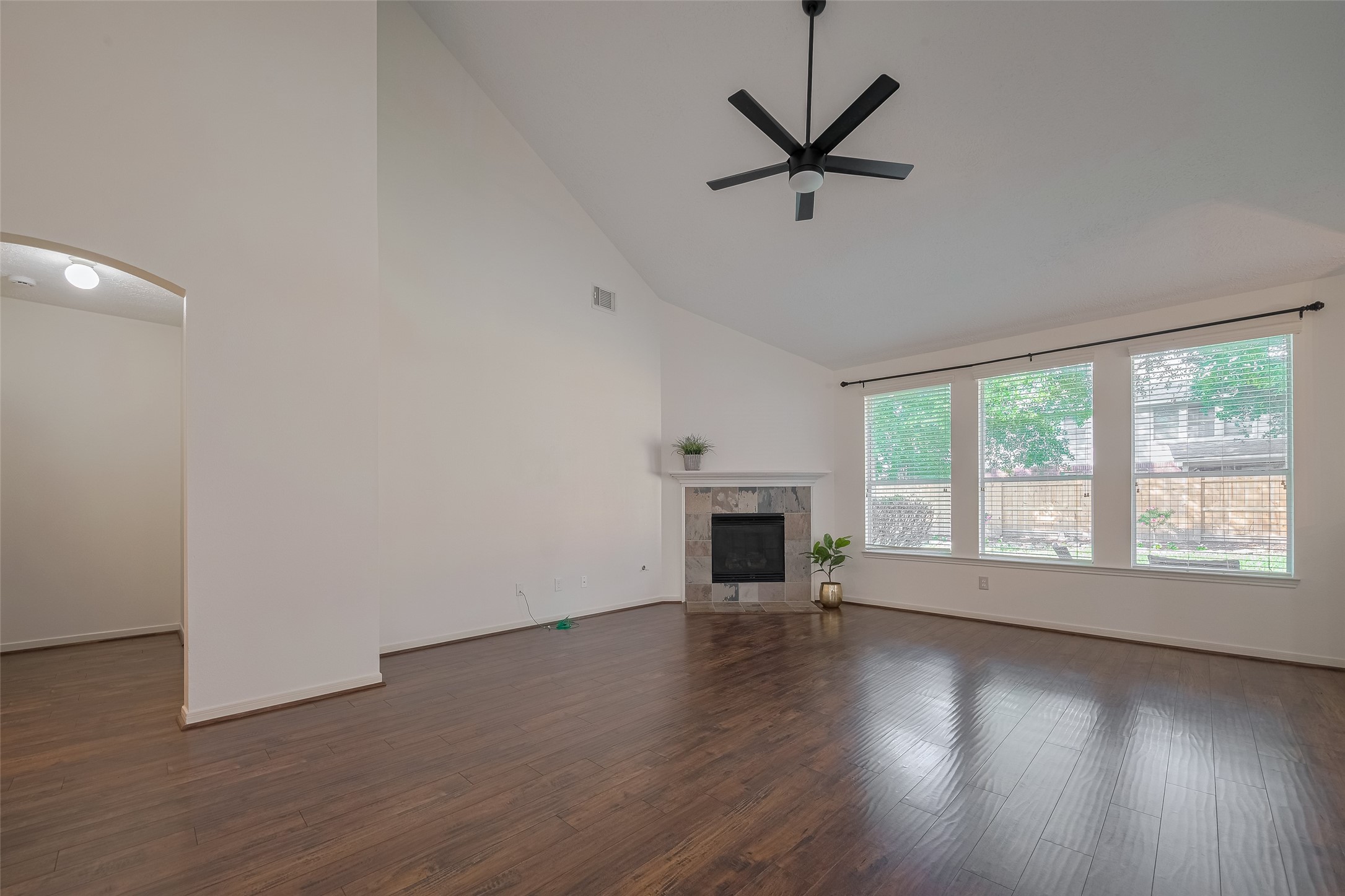 31214 Windcrest Park Lane Spring, TX 77386 - Photo 10 of 45 a view of empty room with wooden floor and fan