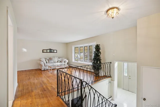 a view of a livingroom with wooden floor