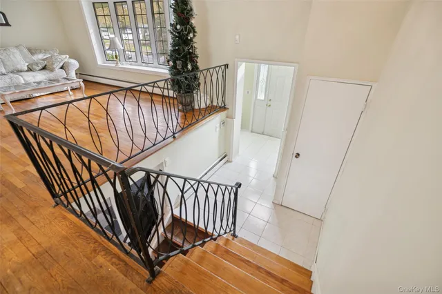 a view of entryway with wooden floor