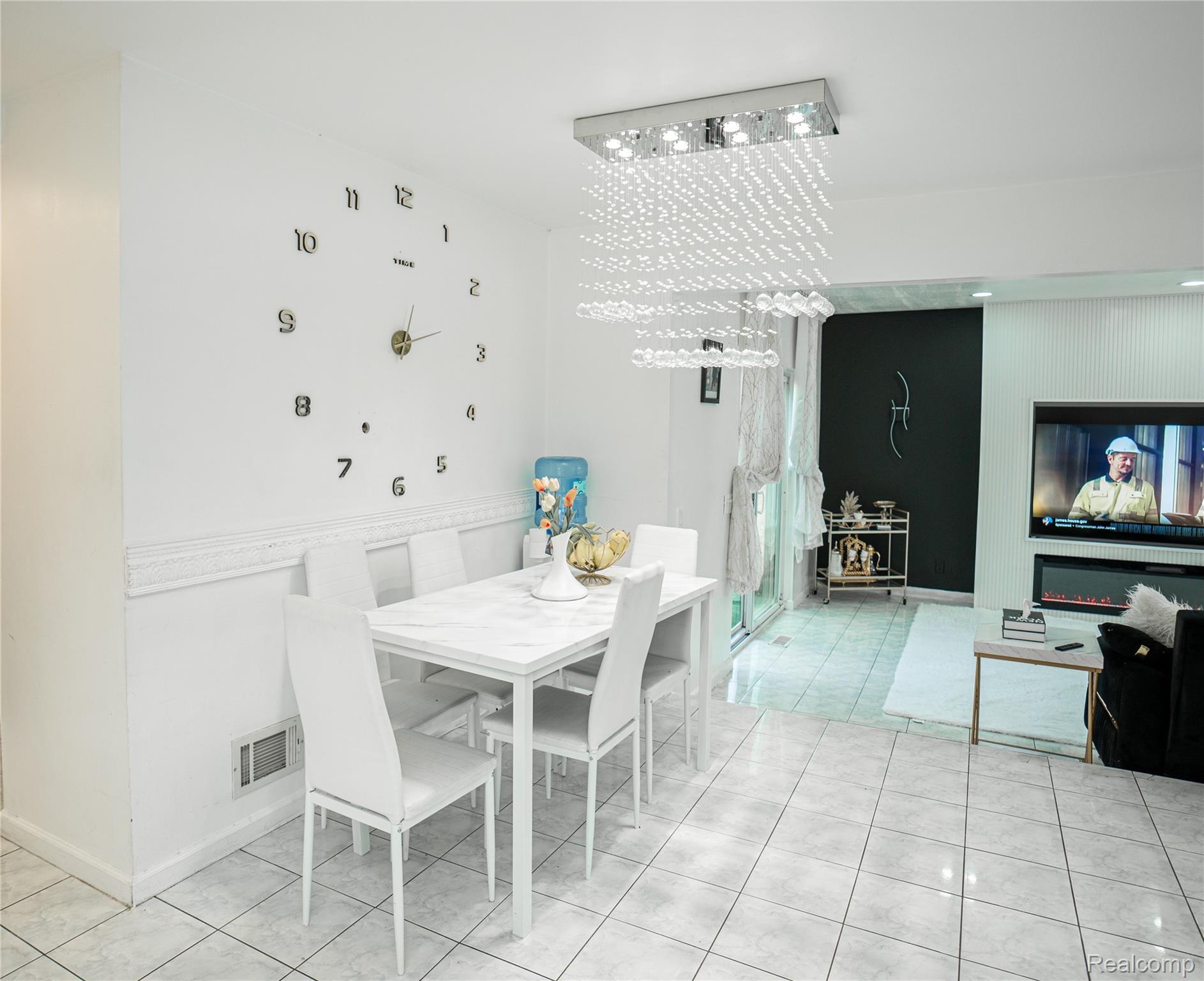 3131 Elmcrest Road Sterling Heights, MI 48310 - Photo 13 of 46 Dining space featuring light tile patterned floors and suspended lighting