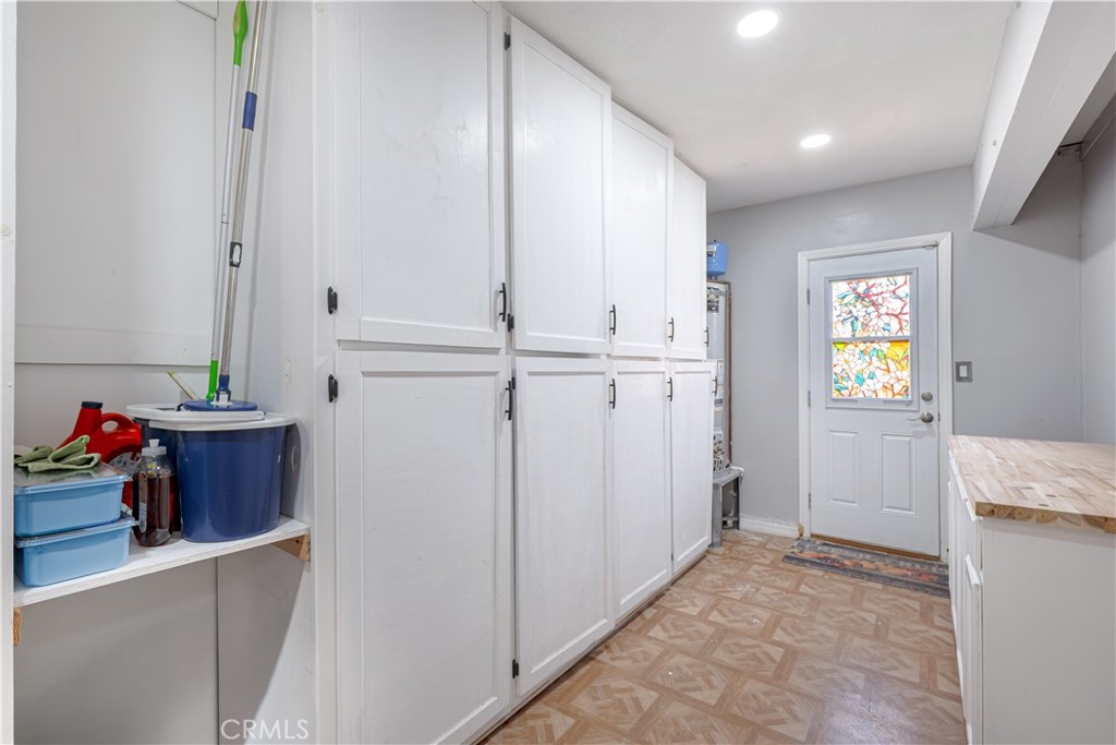2203 Homewood Avenue Simi Valley, CA 93063 - Photo 13 of 37 a view of hallway with window and cabinet