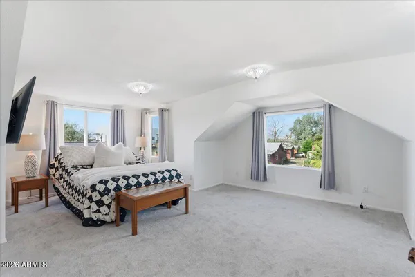 a living room with furniture and furniture